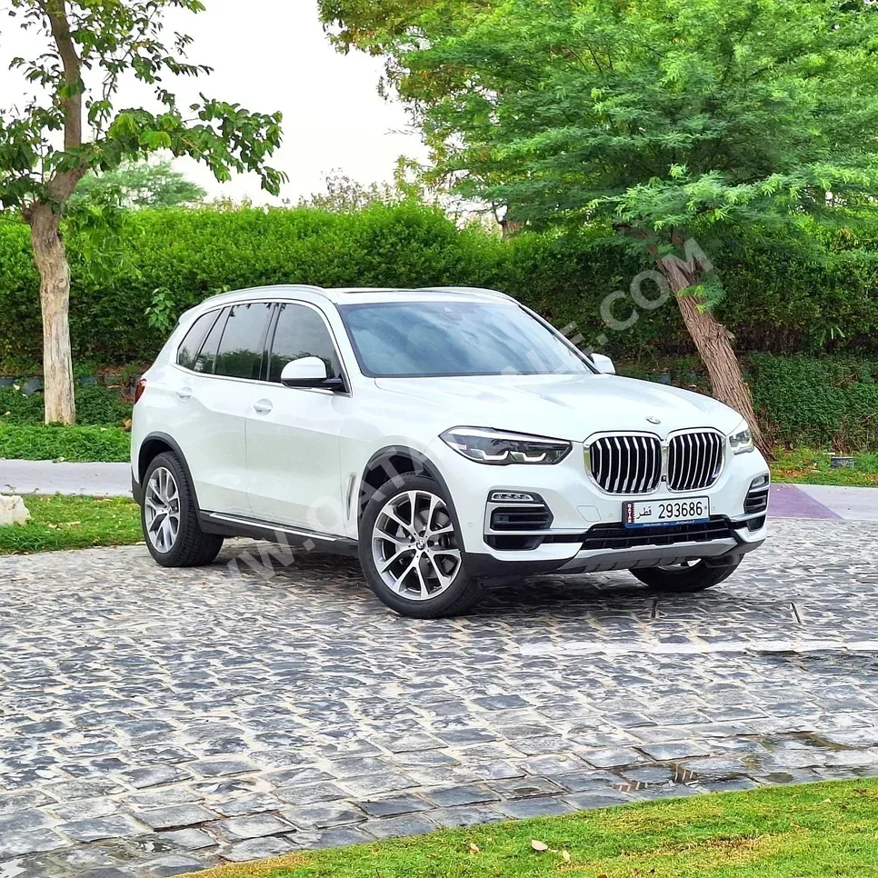 BMW  X-Series  X5 40i  2019  Automatic  66,000 Km  6 Cylinder  All Wheel Drive (AWD)  SUV  Pearl