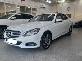 Mercedes-Benz  E-Class  200  2016  Automatic  74,000 Km  4 Cylinder  Rear Wheel Drive (RWD)  Sedan  White