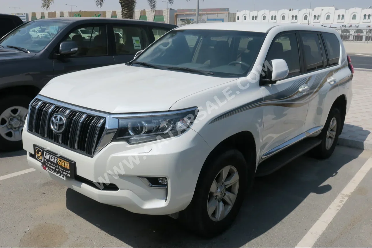  Toyota  Prado  TXL  2019  Automatic  80,000 Km  6 Cylinder  Four Wheel Drive (4WD)  SUV  White  With Warranty