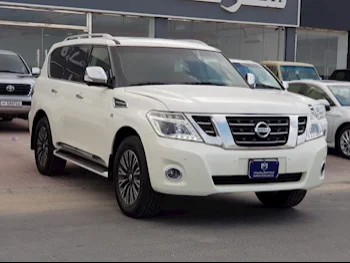 Nissan  Patrol  Platinum  2014  Automatic  158,000 Km  8 Cylinder  Four Wheel Drive (4WD)  SUV  White