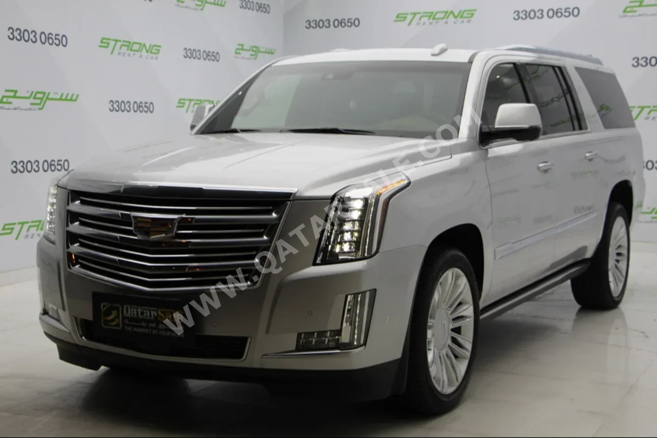 Cadillac  Escalade  Platinum  2017  Automatic  107,000 Km  8 Cylinder  Four Wheel Drive (4WD)  SUV  Silver