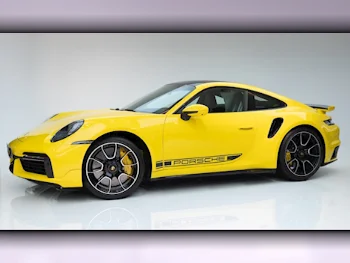 Porsche  911  Turbo S  2023  Automatic  3٬000 Km  6 Cylinder  Rear Wheel Drive (RWD)  Coupe / Sport  Yellow  With Warranty