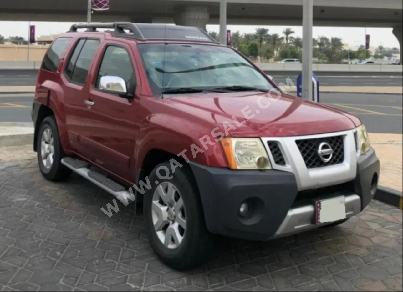 Nissan  Xterra  SE  2009  Automatic  156,700 Km  6 Cylinder  Four Wheel Drive (4WD)  SUV  Red