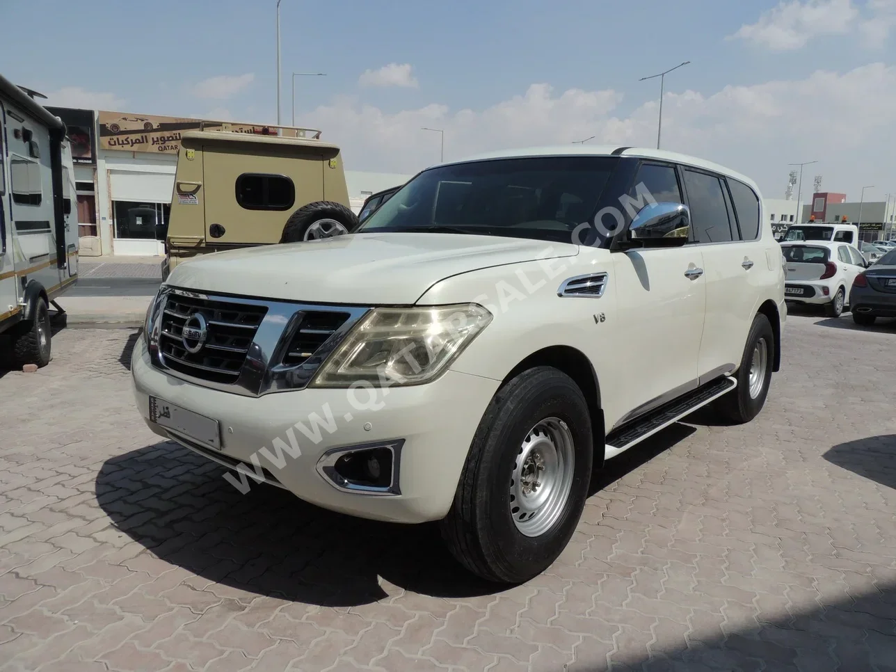 Nissan  Patrol  2012  Manual  218,000 Km  8 Cylinder  Four Wheel Drive (4WD)  SUV  White