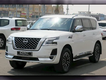 Nissan  Patrol  Platinum  2023  Automatic  44,000 Km  6 Cylinder  Four Wheel Drive (4WD)  SUV  White  With Warranty