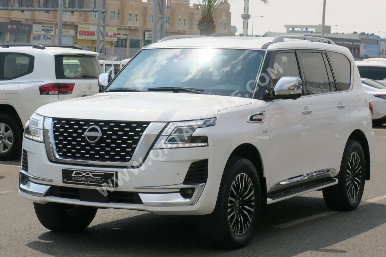 Nissan  Patrol  Platinum  2023  Automatic  44,000 Km  6 Cylinder  Four Wheel Drive (4WD)  SUV  White  With Warranty