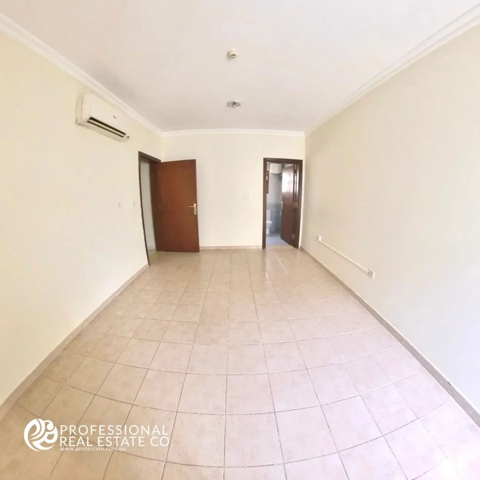 2 Bedrooms  Apartment  in Doha -  Najma  Not Furnished