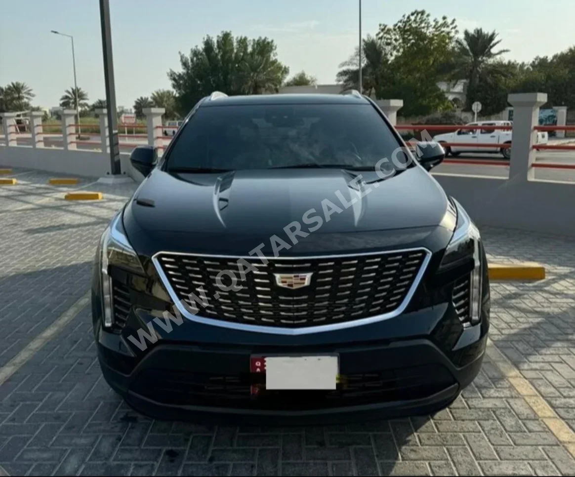 Cadillac  XT4  PREMIUM LUXURY  2023  Automatic  30,000 Km  4 Cylinder  Front Wheel Drive (FWD)  Sedan  Black  With Warranty