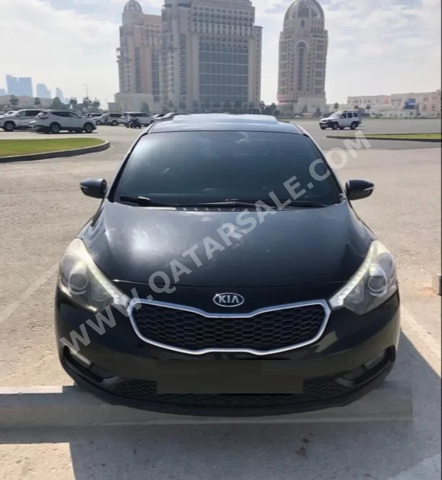 Kia  Cerato  1.6 EX  2014  Automatic  185 Km  4 Cylinder  Front Wheel Drive (FWD)  Sedan  Black