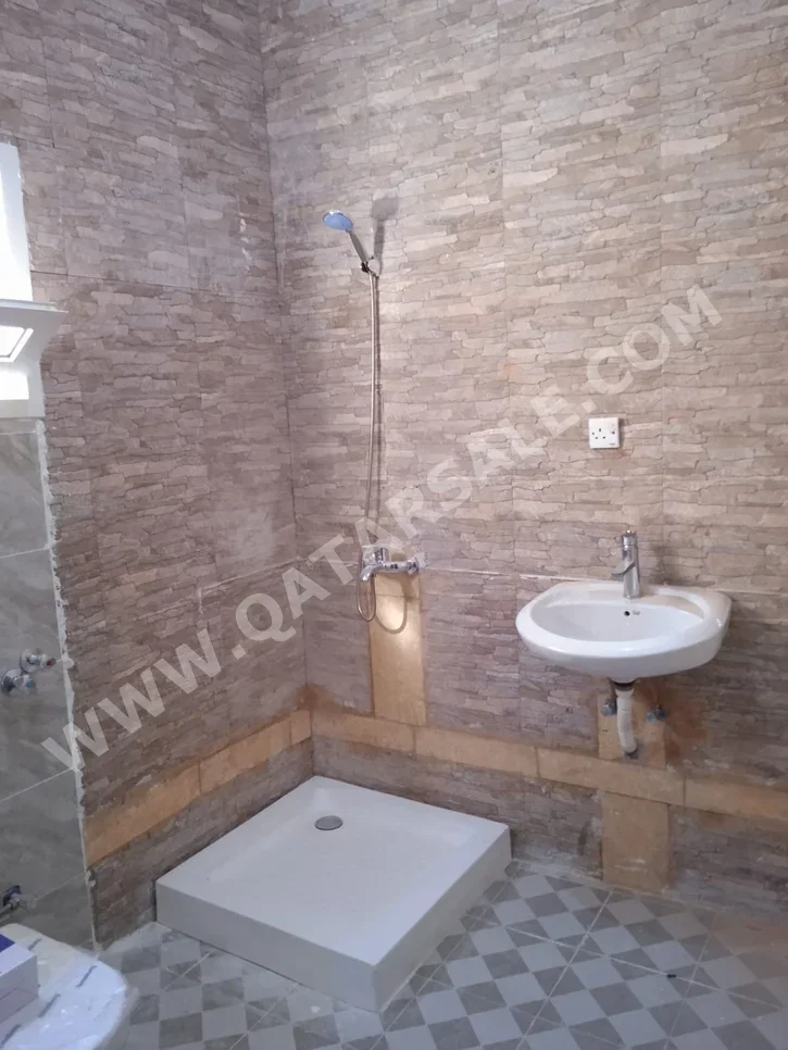 2 Bedrooms  Apartment  For Rent  in Al Rayyan -  Umm Al Seneem  Not Furnished