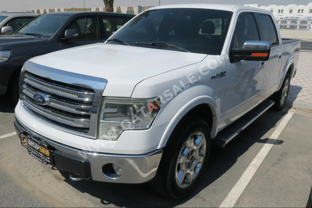 Ford  F  150 LARIAT  2014  Automatic  92,000 Km  8 Cylinder  Four Wheel Drive (4WD)  Pick Up  White