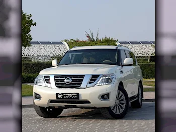 Nissan  Patrol  LE  2014  Automatic  237,000 Km  8 Cylinder  Four Wheel Drive (4WD)  SUV  White