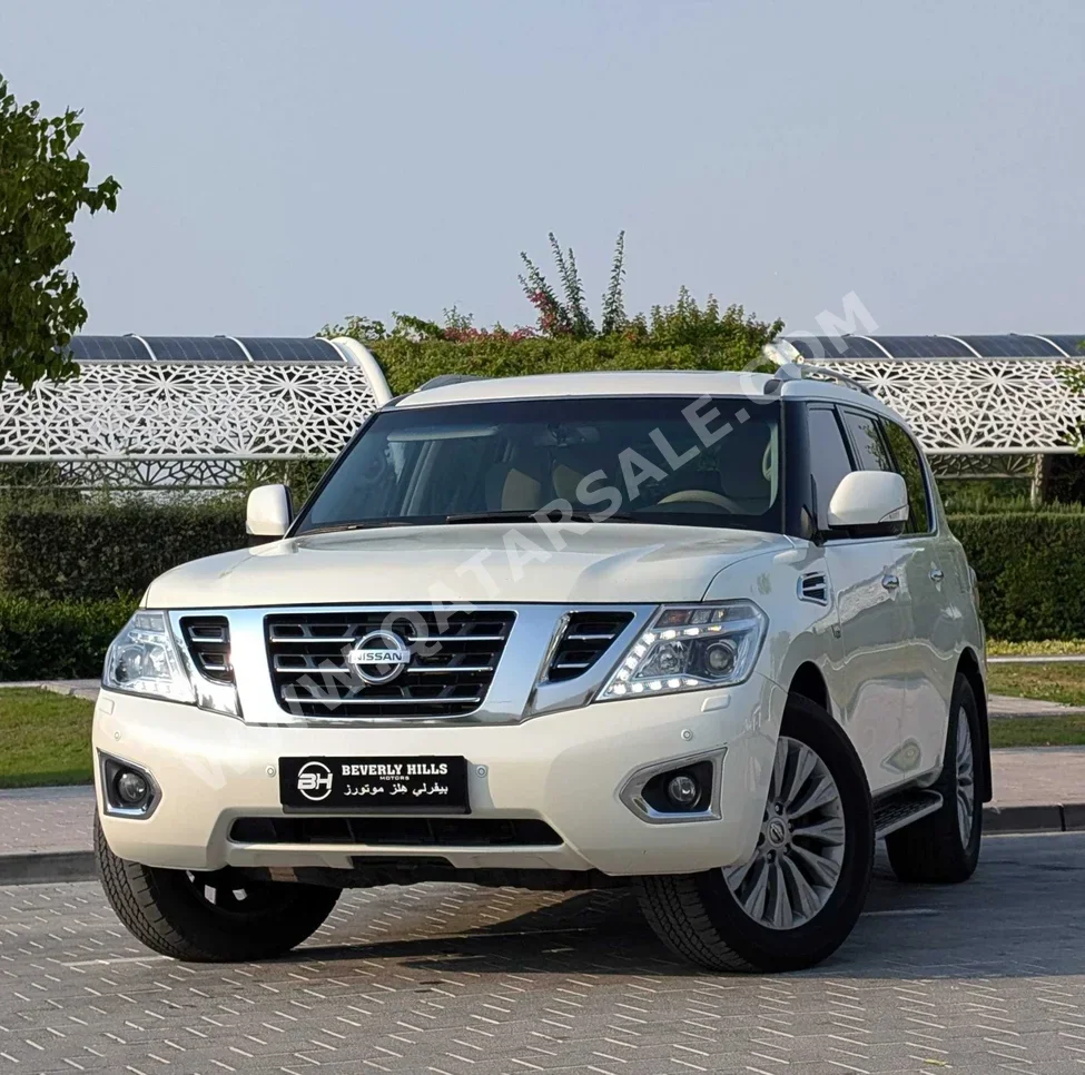 Nissan  Patrol  LE  2014  Automatic  237,000 Km  8 Cylinder  Four Wheel Drive (4WD)  SUV  White