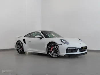 Porsche  911  Turbo  2023  Automatic  3,400 Km  6 Cylinder  Rear Wheel Drive (RWD)  Coupe / Sport  White  With Warranty