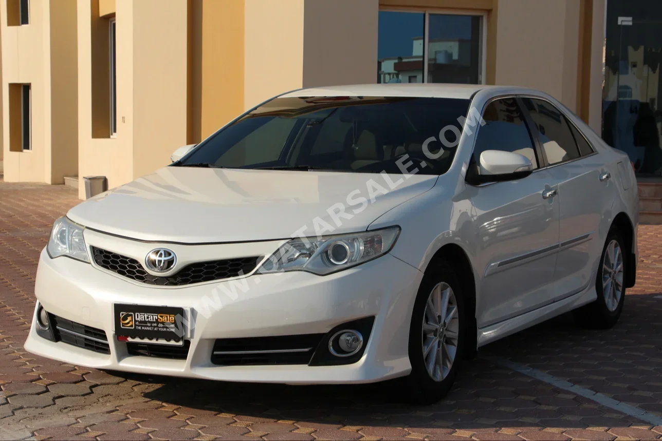 Toyota  Camry  GLX  2012  Automatic  113,000 Km  4 Cylinder  Front Wheel Drive (FWD)  Sedan  White