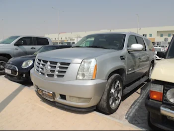  Cadillac  Escalade  2012  Automatic  243,000 Km  8 Cylinder  Four Wheel Drive (4WD)  SUV  Silver  With Warranty