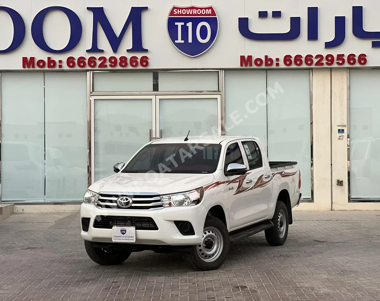 Toyota  Hilux  2023  Manual  10,000 Km  4 Cylinder  Four Wheel Drive (4WD)  Pick Up  White  With Warranty