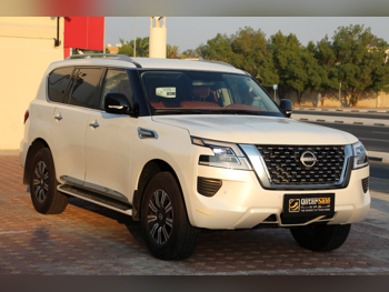 نيسان باترول أكس أي 2023 اوتوماتيك 9,000 كم 6 سلندر دفع رباعي اس يو في أبيض تحت الضمان