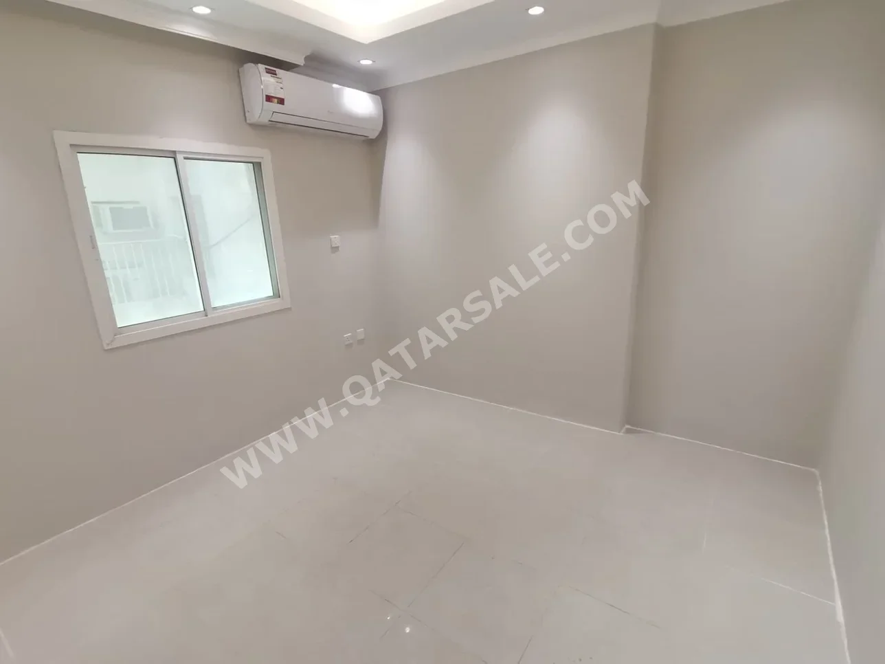 2 Bedrooms  Apartment  in Doha -  Najma  Not Furnished