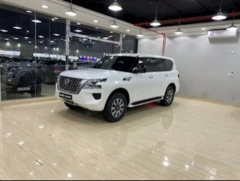 Nissan  Patrol  XE  2022  Automatic  12,000 Km  6 Cylinder  Four Wheel Drive (4WD)  SUV  White  With Warranty