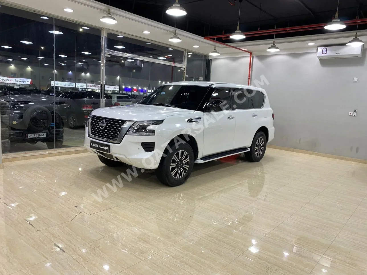 Nissan  Patrol  XE  2022  Automatic  12,000 Km  6 Cylinder  Four Wheel Drive (4WD)  SUV  White  With Warranty