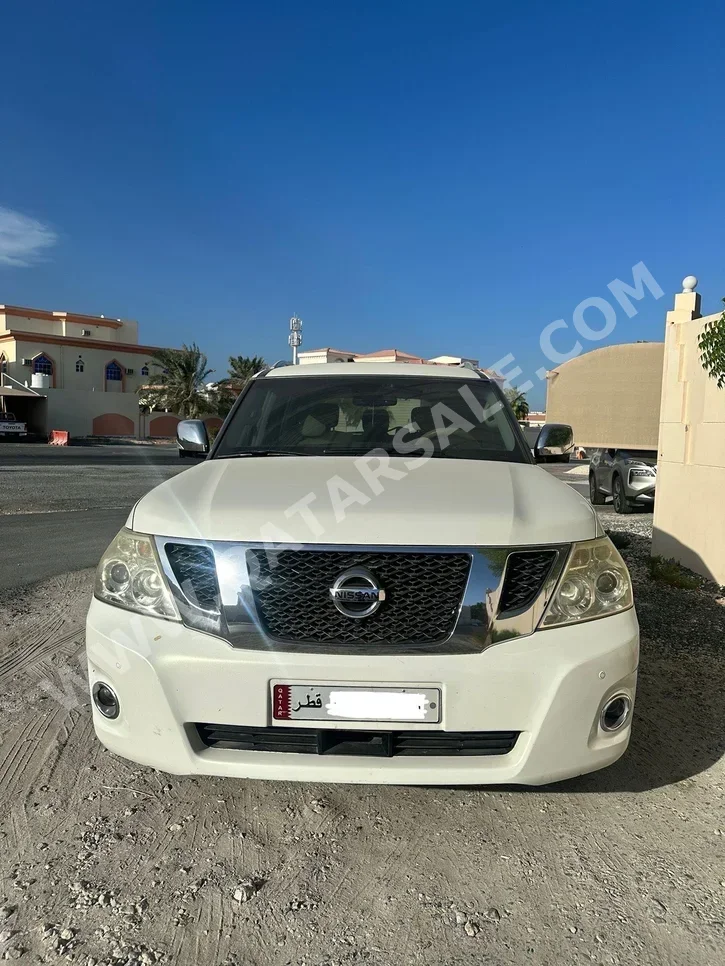 Nissan  Patrol  LE  2012  Automatic  195٬000 Km  8 Cylinder  Four Wheel Drive (4WD)  SUV  White