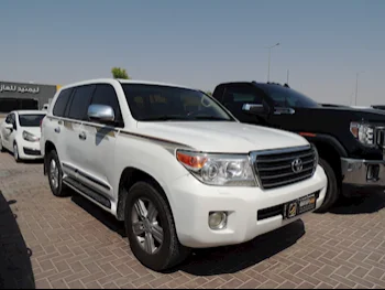  Toyota  Land Cruiser  GXR  2013  Automatic  385,000 Km  8 Cylinder  Four Wheel Drive (4WD)  SUV  White  With Warranty