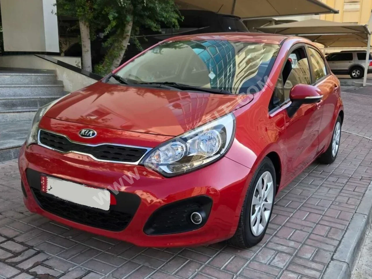 Kia  Rio  2015  Tiptronic  136,600 Km  4 Cylinder  Front Wheel Drive (FWD)  Hatchback  Red