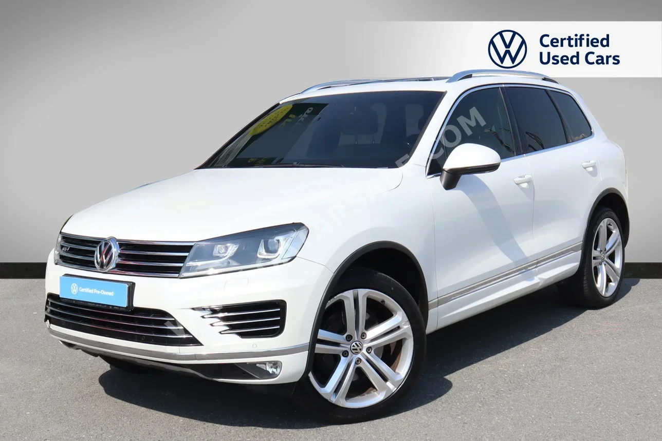 Volkswagen  Touareg  R line  2015  Automatic  141,000 Km  8 Cylinder  All Wheel Drive (AWD)  SUV  White