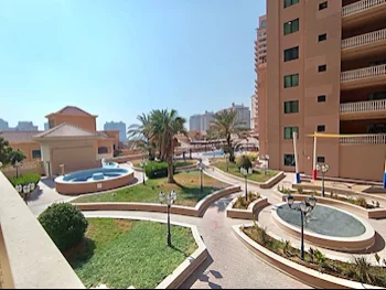 2 Bedrooms  Apartment  For Rent  in Doha -  The Pearl  Semi Furnished