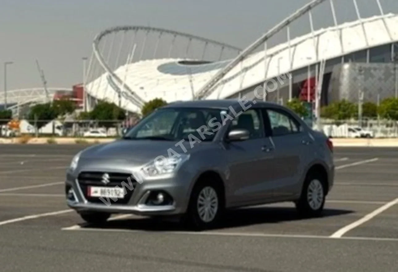 Suzuki  Dzire  2022  Automatic  69,500 Km  4 Cylinder  Front Wheel Drive (FWD)  Sedan  Gray