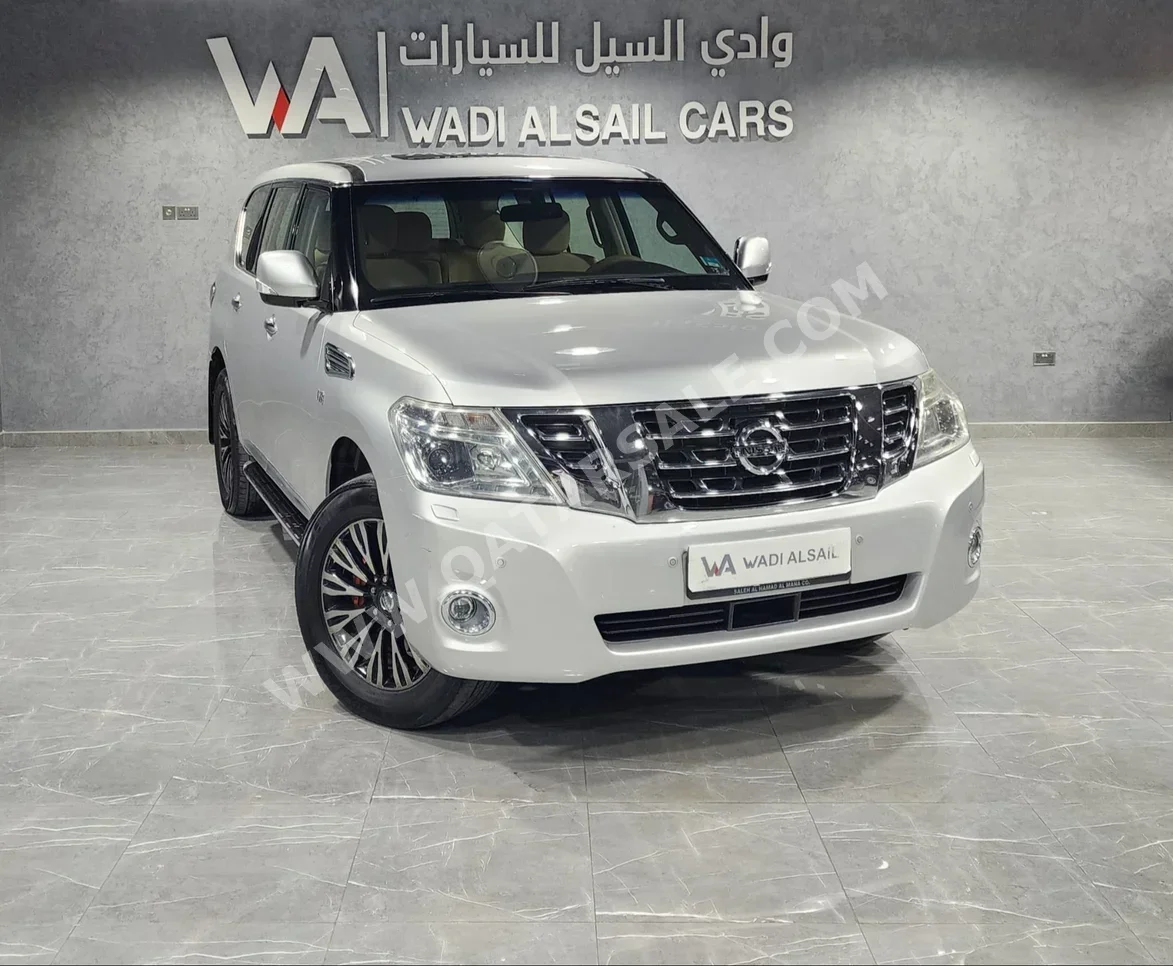 Nissan  Patrol  SE  2016  Automatic  224,000 Km  8 Cylinder  Four Wheel Drive (4WD)  SUV  Silver