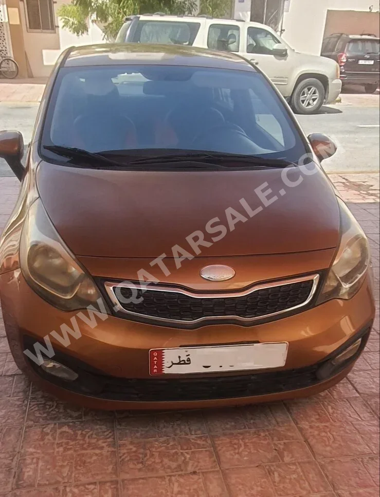 Kia  Rio  2013  Automatic  166,000 Km  4 Cylinder  Front Wheel Drive (FWD)  Classic  Gold