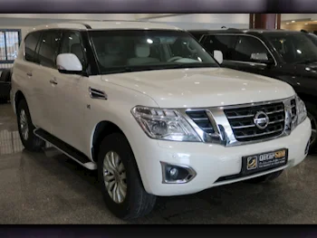 Nissan  Patrol  SE  2015  Automatic  281,000 Km  8 Cylinder  Four Wheel Drive (4WD)  SUV  White