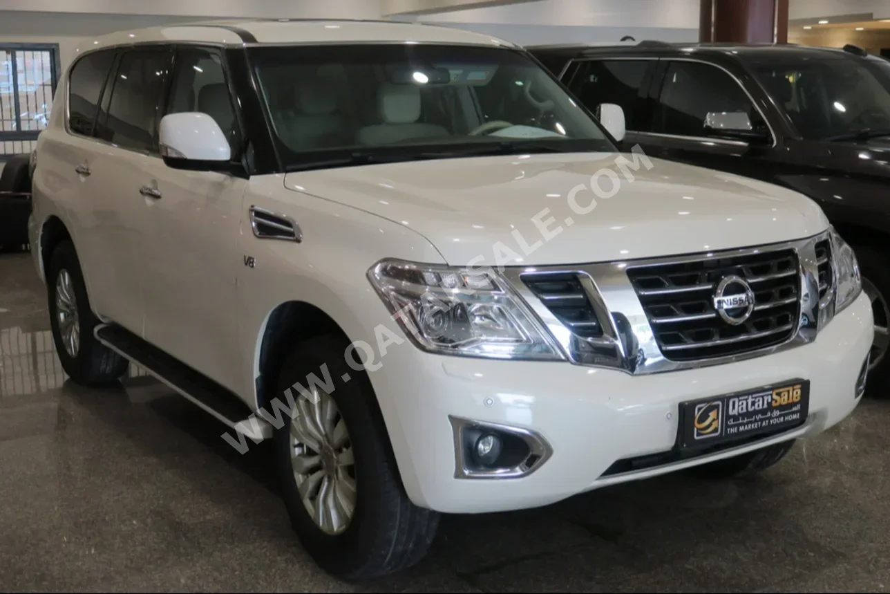 Nissan  Patrol  SE  2015  Automatic  281,000 Km  8 Cylinder  Four Wheel Drive (4WD)  SUV  White