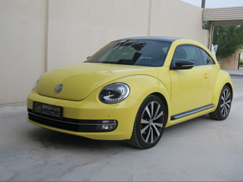 Volkswagen  Beetle  Turbo  2015  Automatic  109,000 Km  4 Cylinder  Front Wheel Drive (FWD)  Hatchback  Yellow