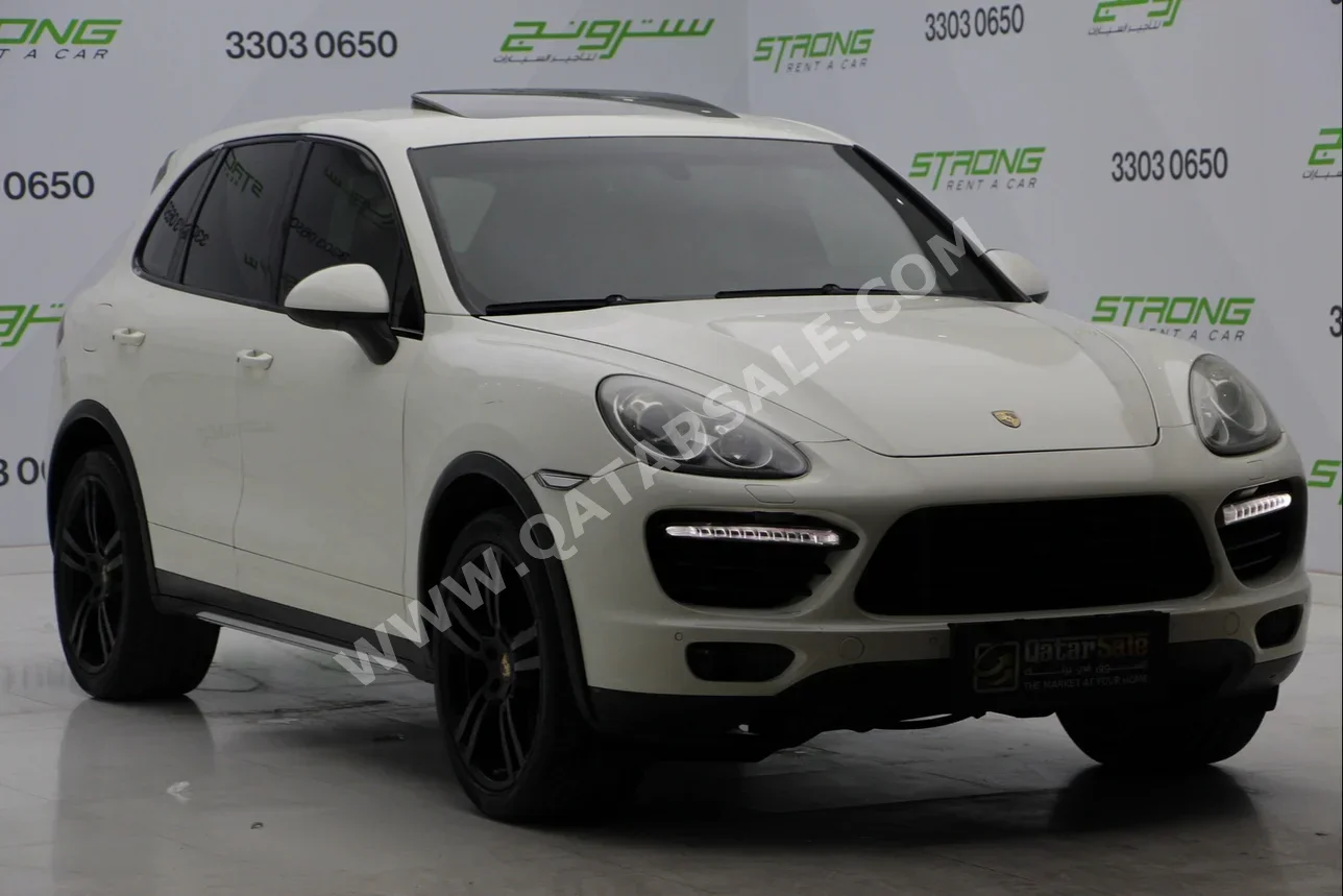 Porsche  Cayenne  Turbo  2011  Automatic  157,000 Km  8 Cylinder  Four Wheel Drive (4WD)  SUV  White