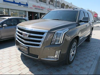 Cadillac  Escalade  2016  Automatic  161,000 Km  8 Cylinder  Four Wheel Drive (4WD)  SUV  Brown