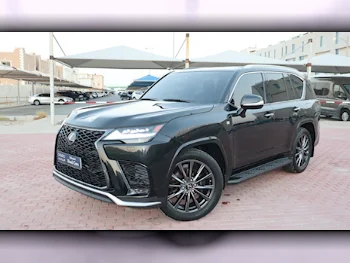 Lexus  LX  600 F Sport  2022  Automatic  58,200 Km  6 Cylinder  All Wheel Drive (AWD)  SUV  Black  With Warranty