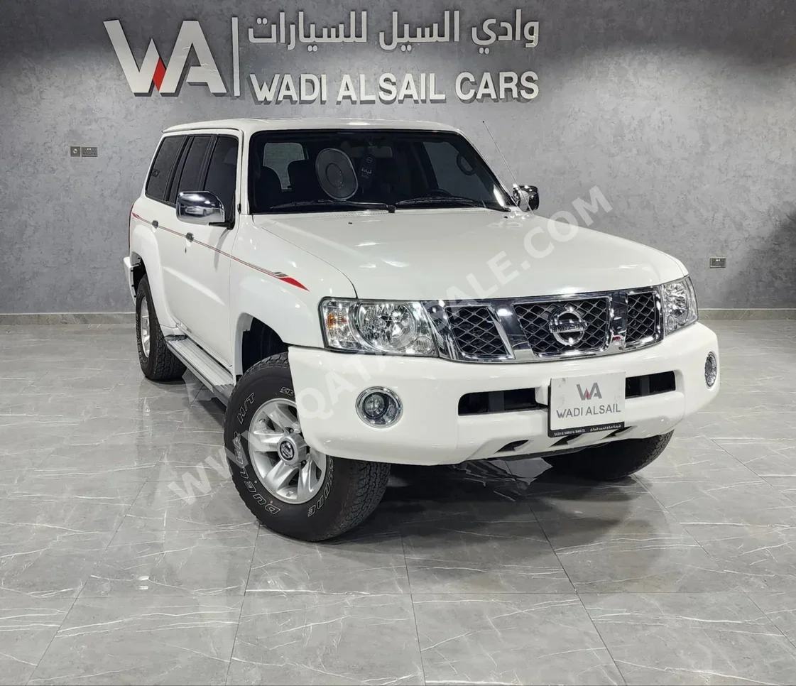 Nissan  Patrol  Safari  2022  Automatic  17,000 Km  6 Cylinder  Four Wheel Drive (4WD)  SUV  White  With Warranty