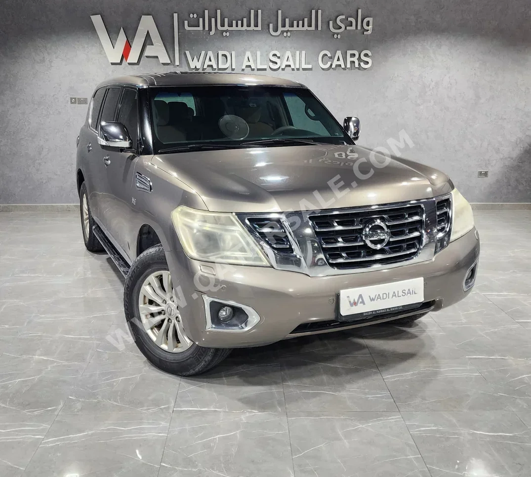 Nissan  Patrol  SE  2015  Automatic  201,000 Km  8 Cylinder  Four Wheel Drive (4WD)  SUV  Beige