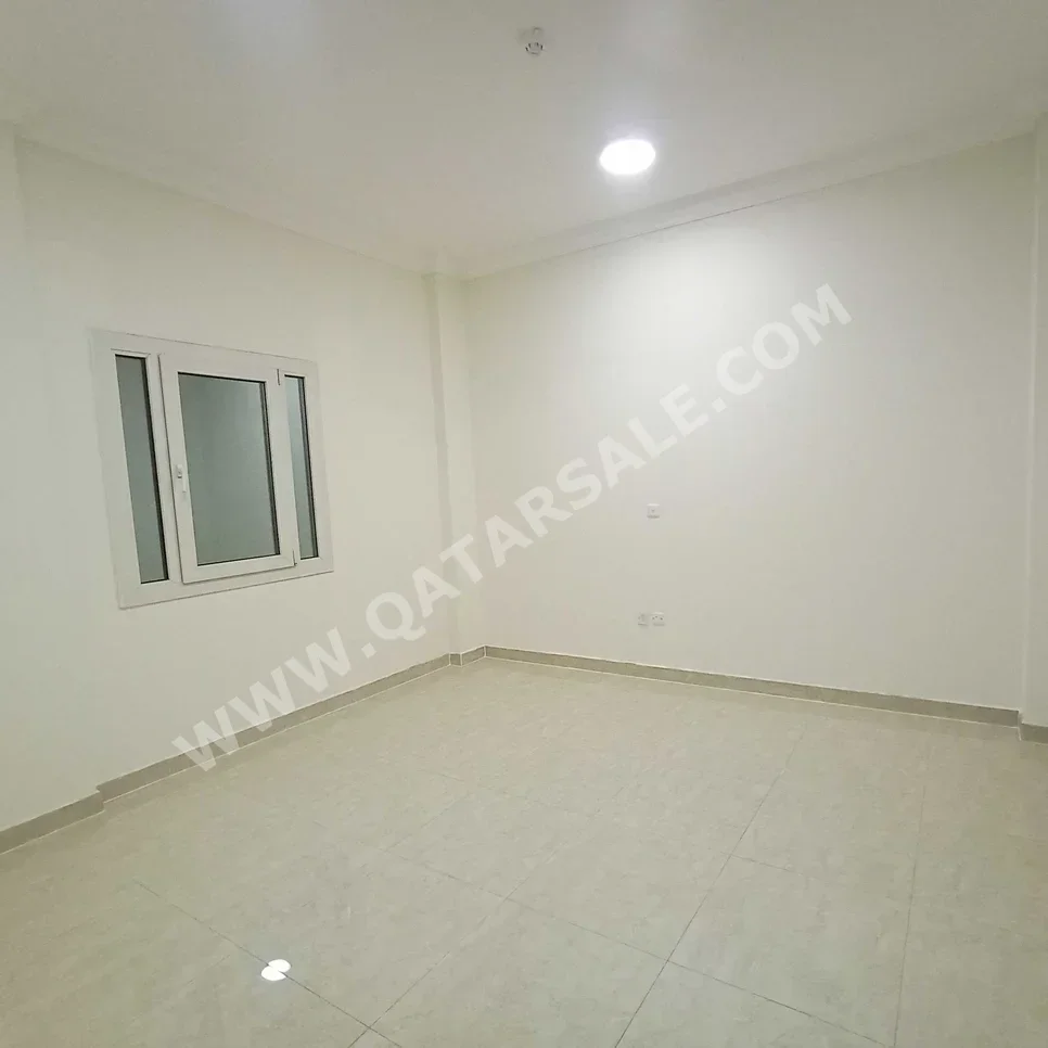 2 Bedrooms  Apartment  For Rent  in Doha -  Al Mansoura  Not Furnished