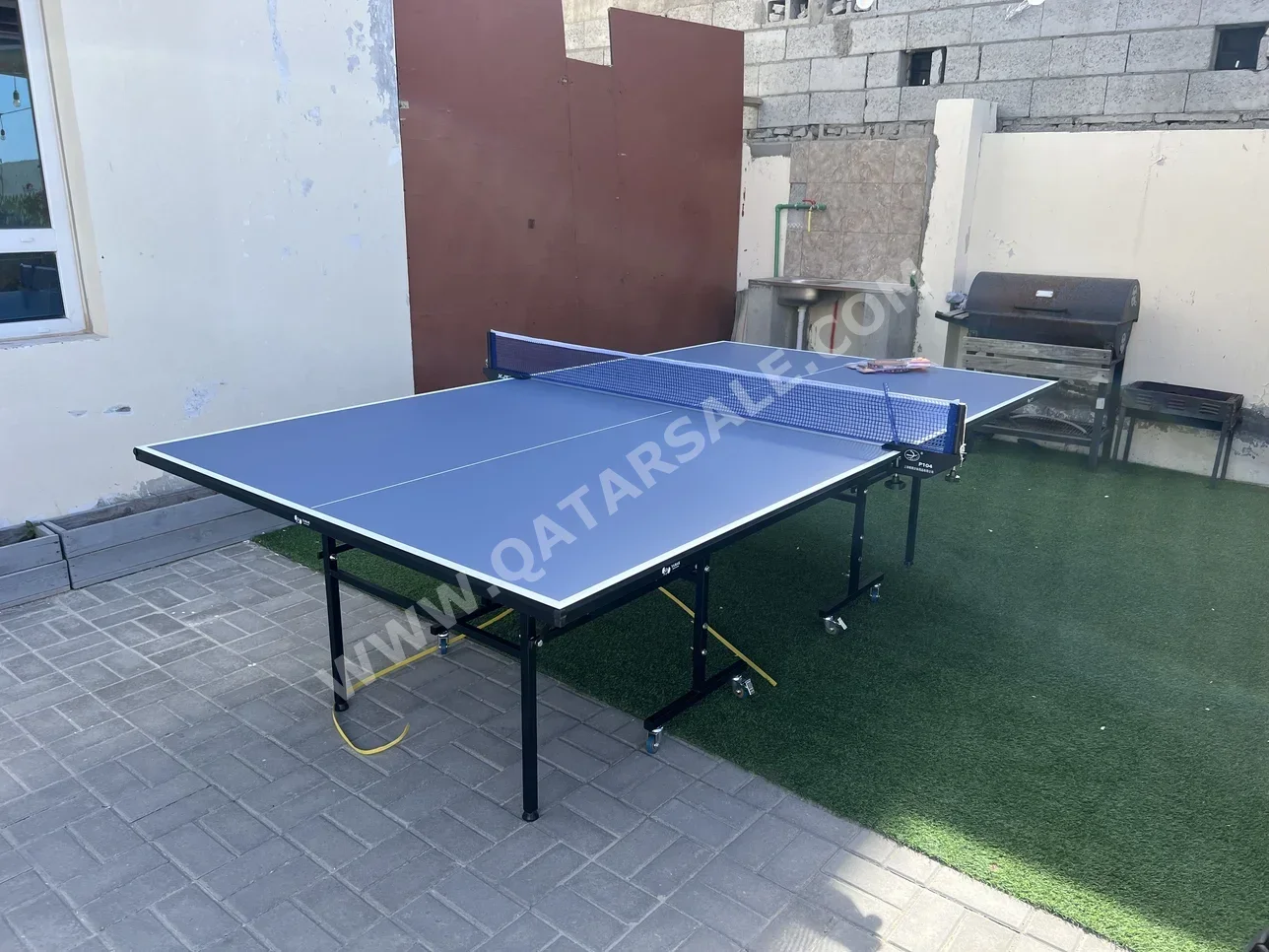 Black and Blue  Tennis (ping pong) Table