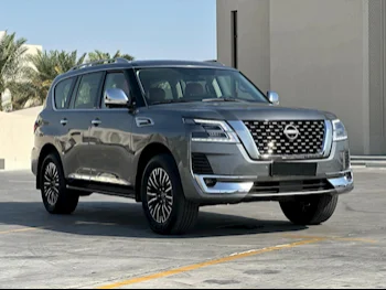 Nissan  Patrol  Platinum  2022  Automatic  21٬000 Km  6 Cylinder  Four Wheel Drive (4WD)  SUV  Gray  With Warranty