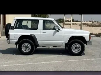  Nissan  Patrol  Safari  1991  Manual  250,000 Km  6 Cylinder  Four Wheel Drive (4WD)  SUV  White  With Warranty