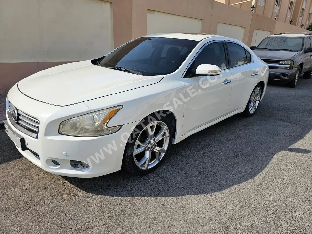 Nissan  Maxima  2012  Automatic  142,000 Km  6 Cylinder  Rear Wheel Drive (RWD)  Sedan  White