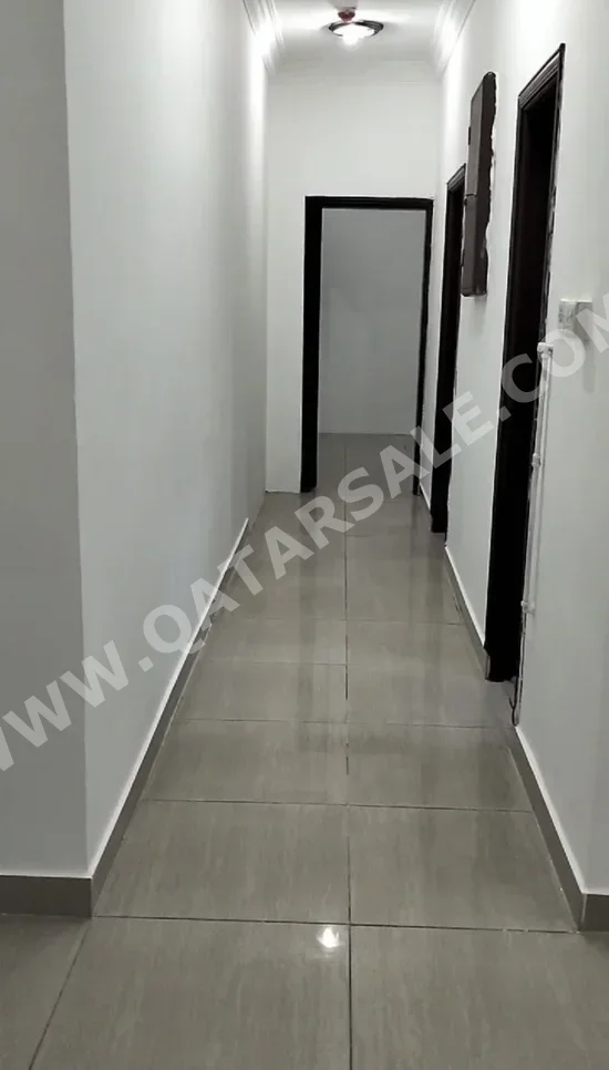 1 Bedrooms  Apartment  For Rent  in Doha -  New Doha  Not Furnished