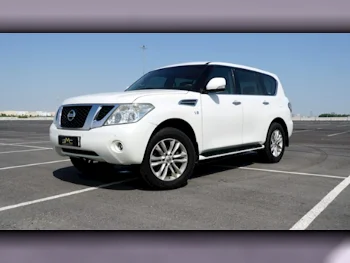 Nissan  Patrol  SE  2013  Automatic  130,000 Km  8 Cylinder  Four Wheel Drive (4WD)  SUV  White