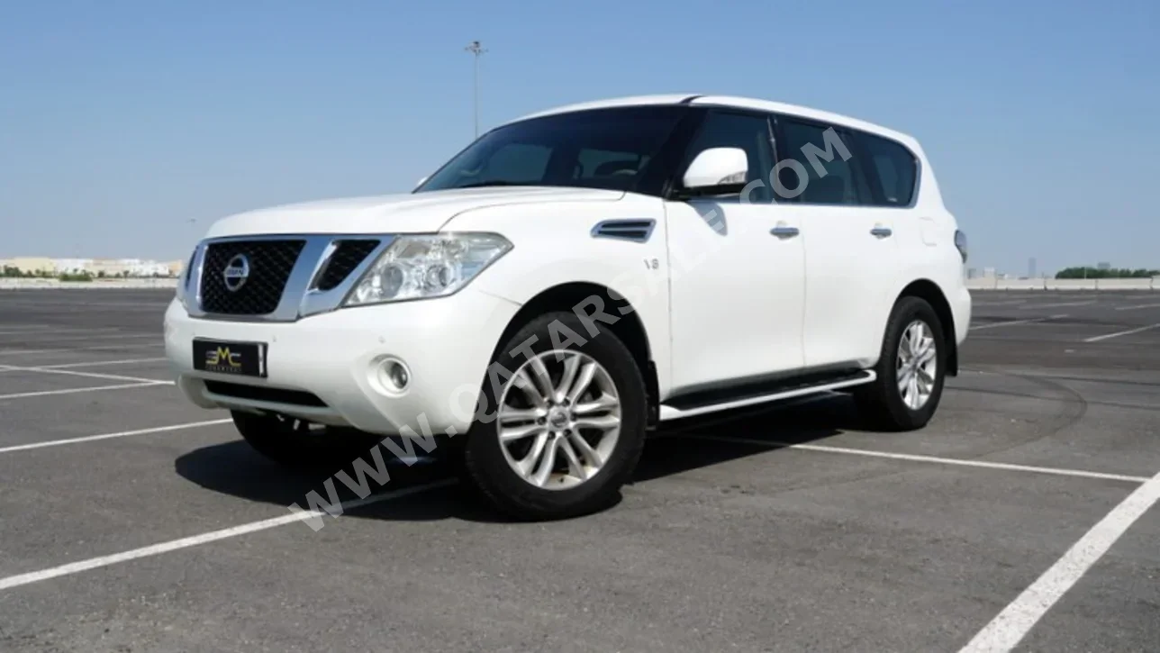 Nissan  Patrol  SE  2013  Automatic  130,000 Km  8 Cylinder  Four Wheel Drive (4WD)  SUV  White