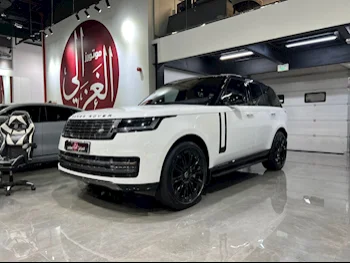  Land Rover  Range Rover  Vogue HSE  2023  Automatic  31,000 Km  8 Cylinder  Four Wheel Drive (4WD)  SUV  White  With Warranty